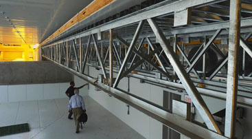 <br />
	The bridge section will span a basin heated and cooled to simulate summer and winter temperatures.Water and salt spray will simulate rain, snow and deicing treatments. Story<br />
