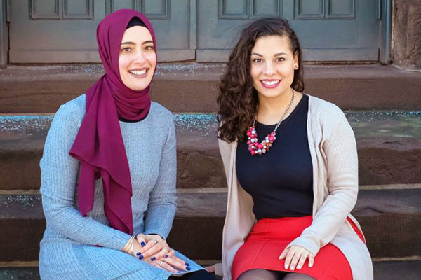 Rutgers Today, Rutgers news - Teaching While Muslim, two GSE alum pose for photos outside