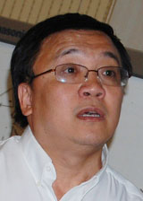 Xiaojun Huang