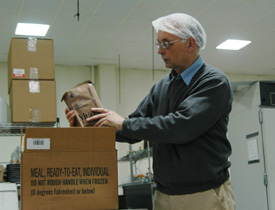 Rieks Bruns checking out new packaging for the food