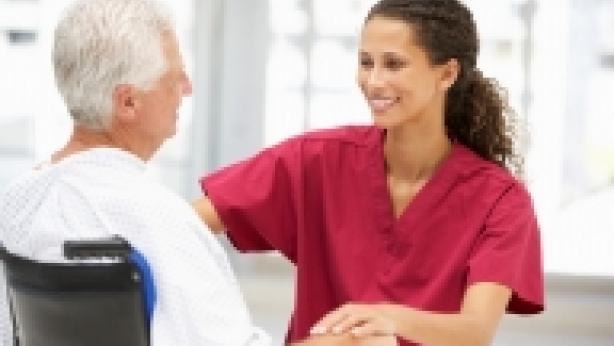 Senior patient talking to doctor